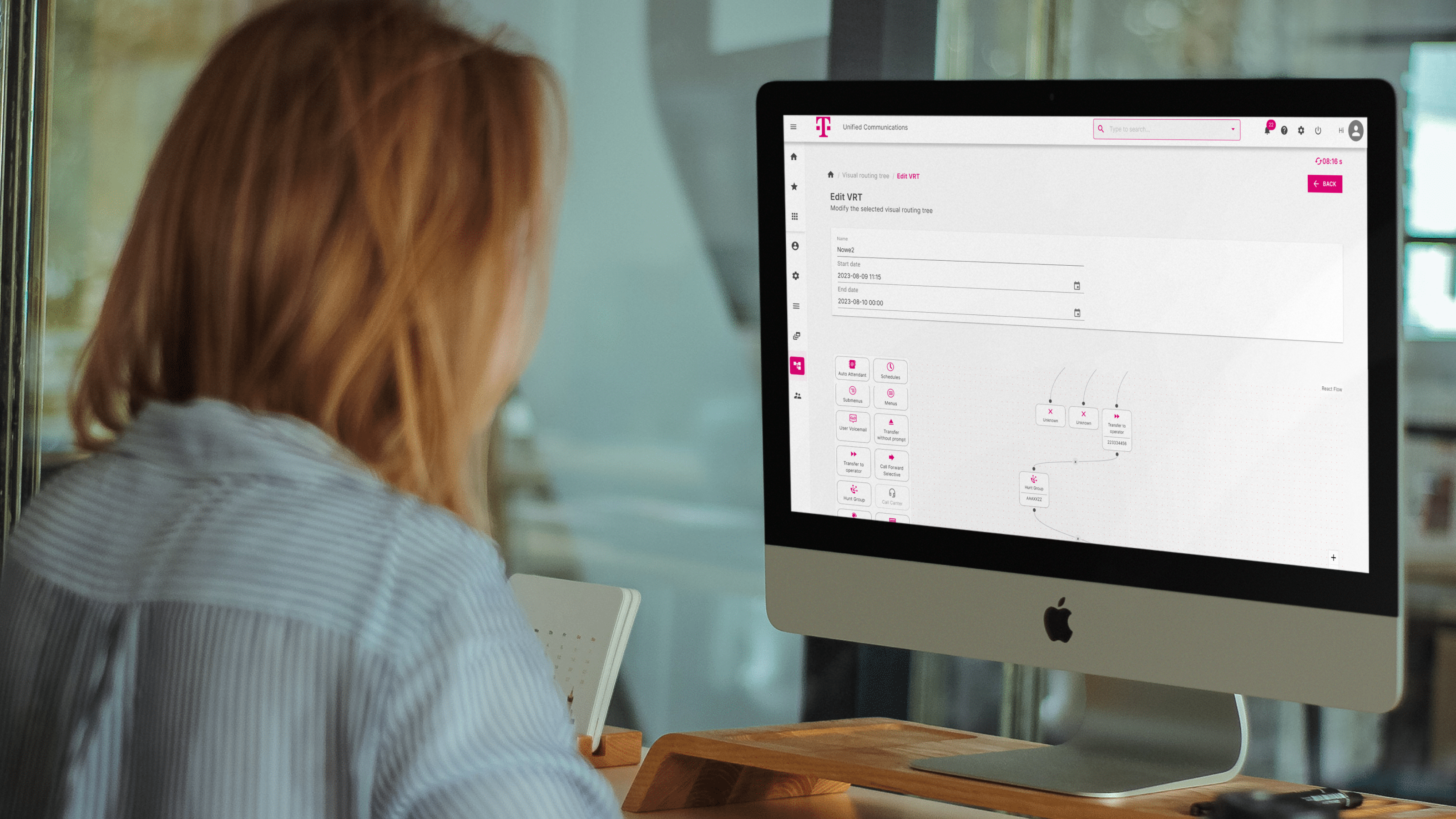 A woman using a new interface of an advanced management system for telecommunications service 